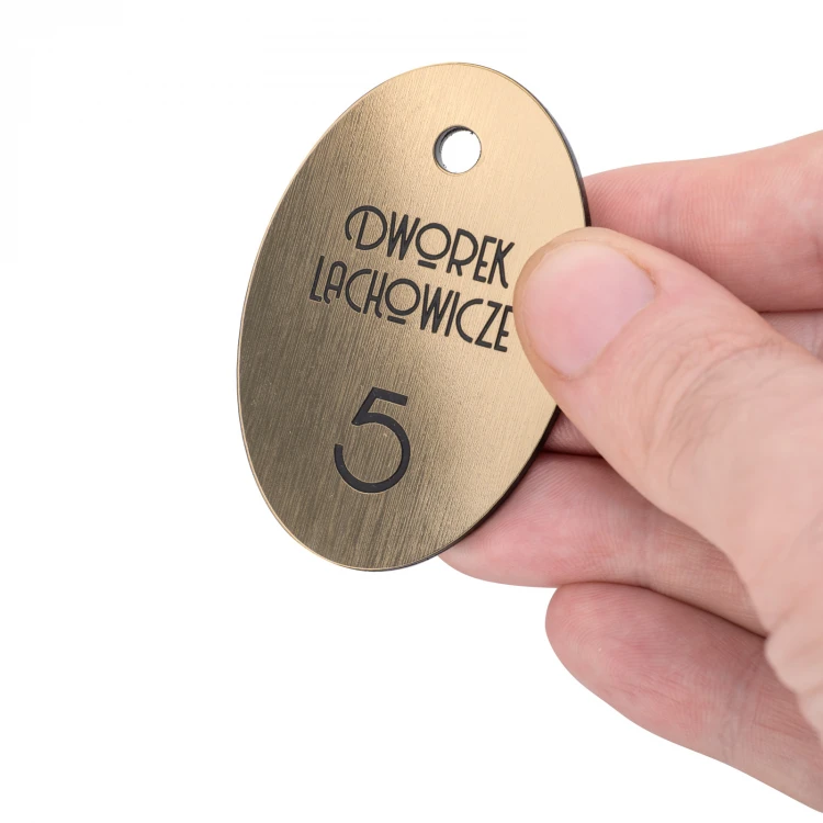 Hotel Keychain - Oval Metallic Gold - size 60x40mm - BRL028