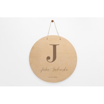 Wooden plaque with child's name - diameter 290mm - NAP071