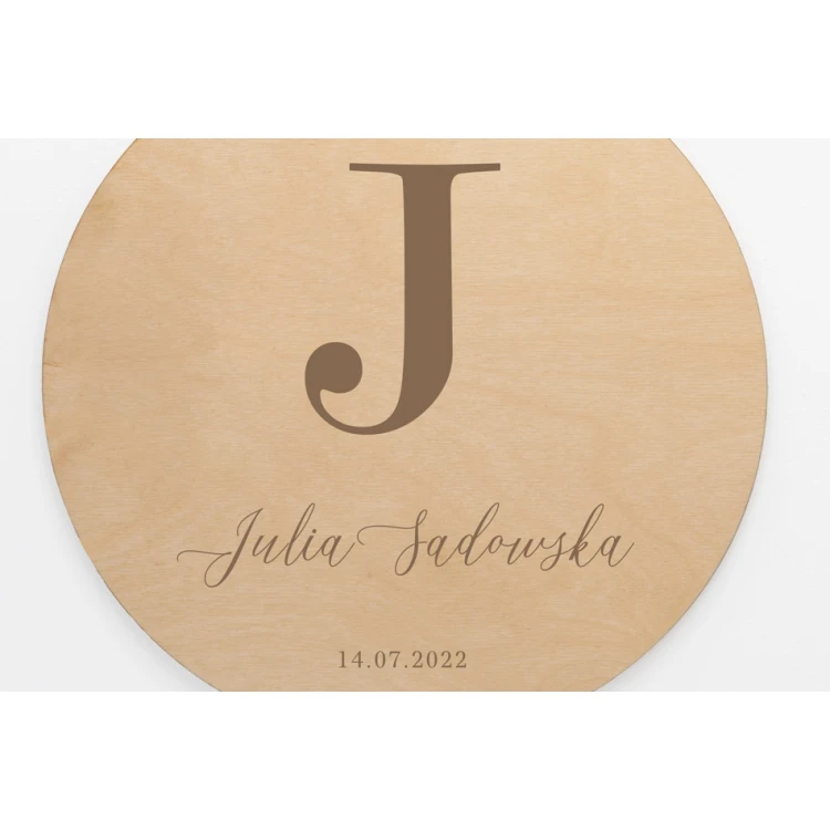 Wooden plaque with child's name - diameter 290mm - NAP071