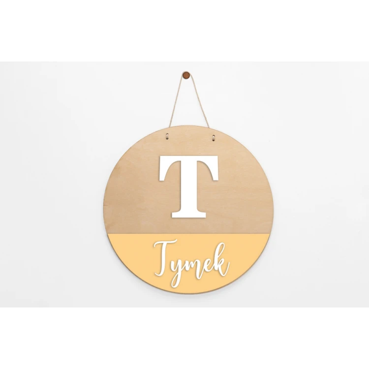 Wooden plaque with child's name - diameter 290mm - NAP065
