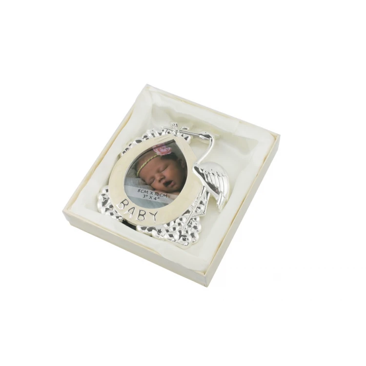 Frame made of beige mother-of-pearl for a baby photo - Stork - RAM016