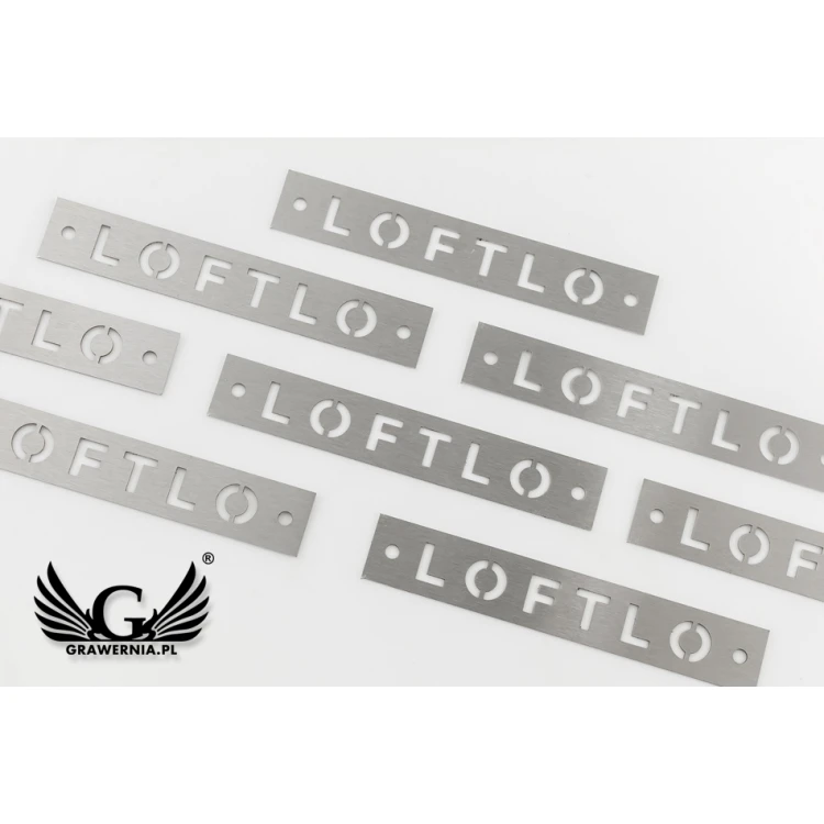 Steel plate - logo cut through - dim. 78x13 gr. 0.5 mm - TAB111