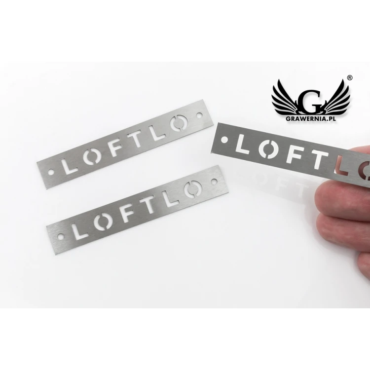 Steel plate - logo cut through - dim. 78x13 gr. 0.5 mm - TAB111
