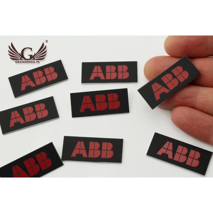 Black anodised aluminium logo plates - indestructible print - dimensions: 35x15mm