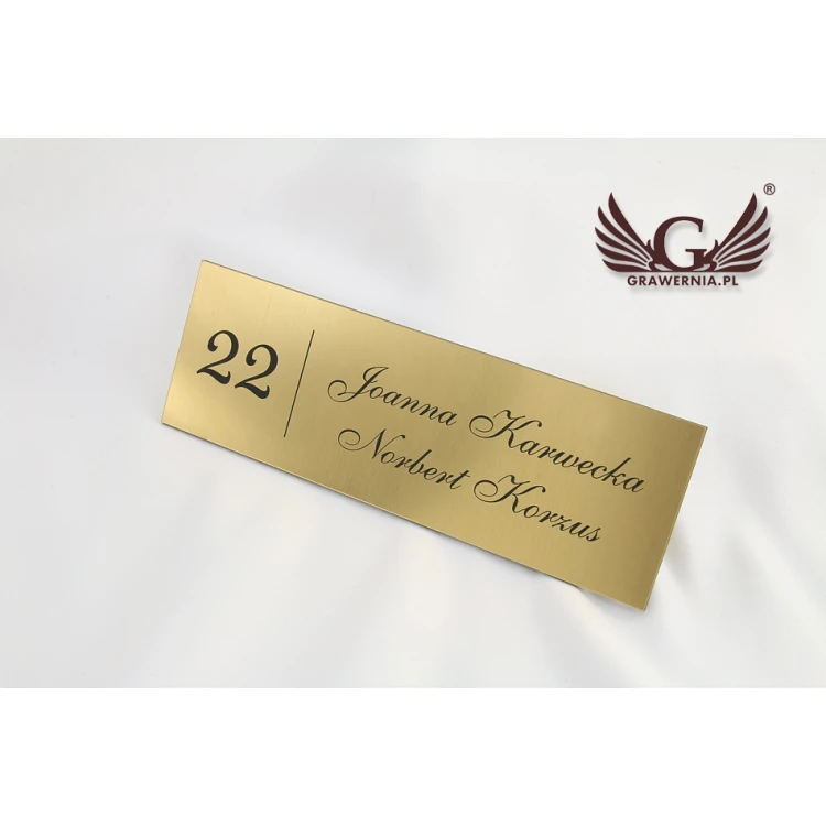 Door sign with two surnames